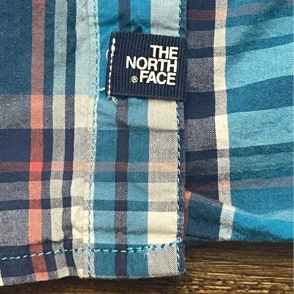 Men’s The North Face 100% cotton flannel blue plaid shirt. Size Medium. EUC.